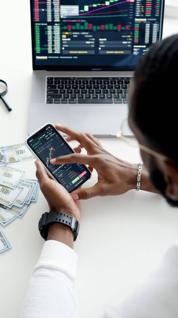 A man is checking GIB Global Investment Bank’s microlending service